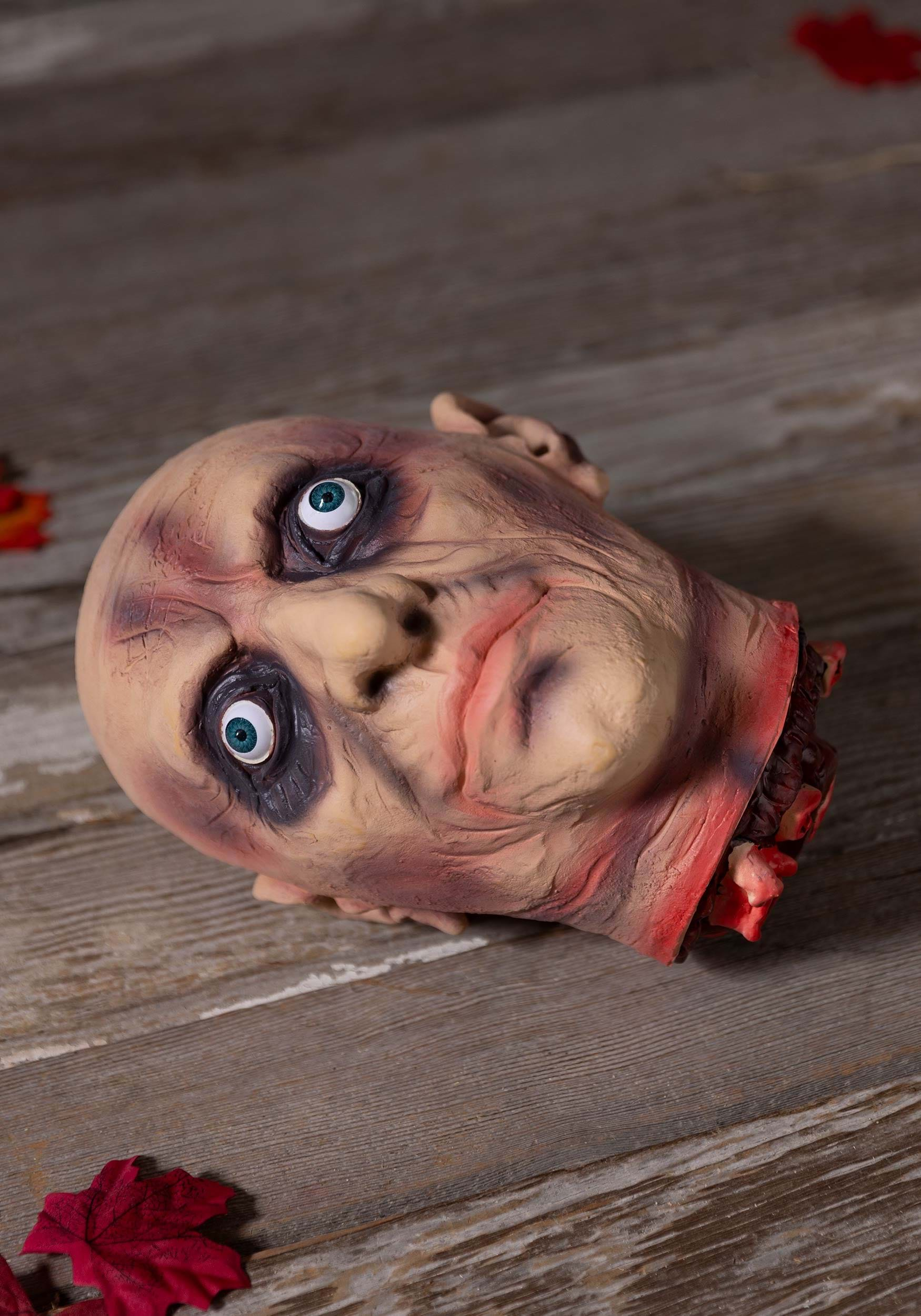 Wide Eyed Severed Head Decor Prop