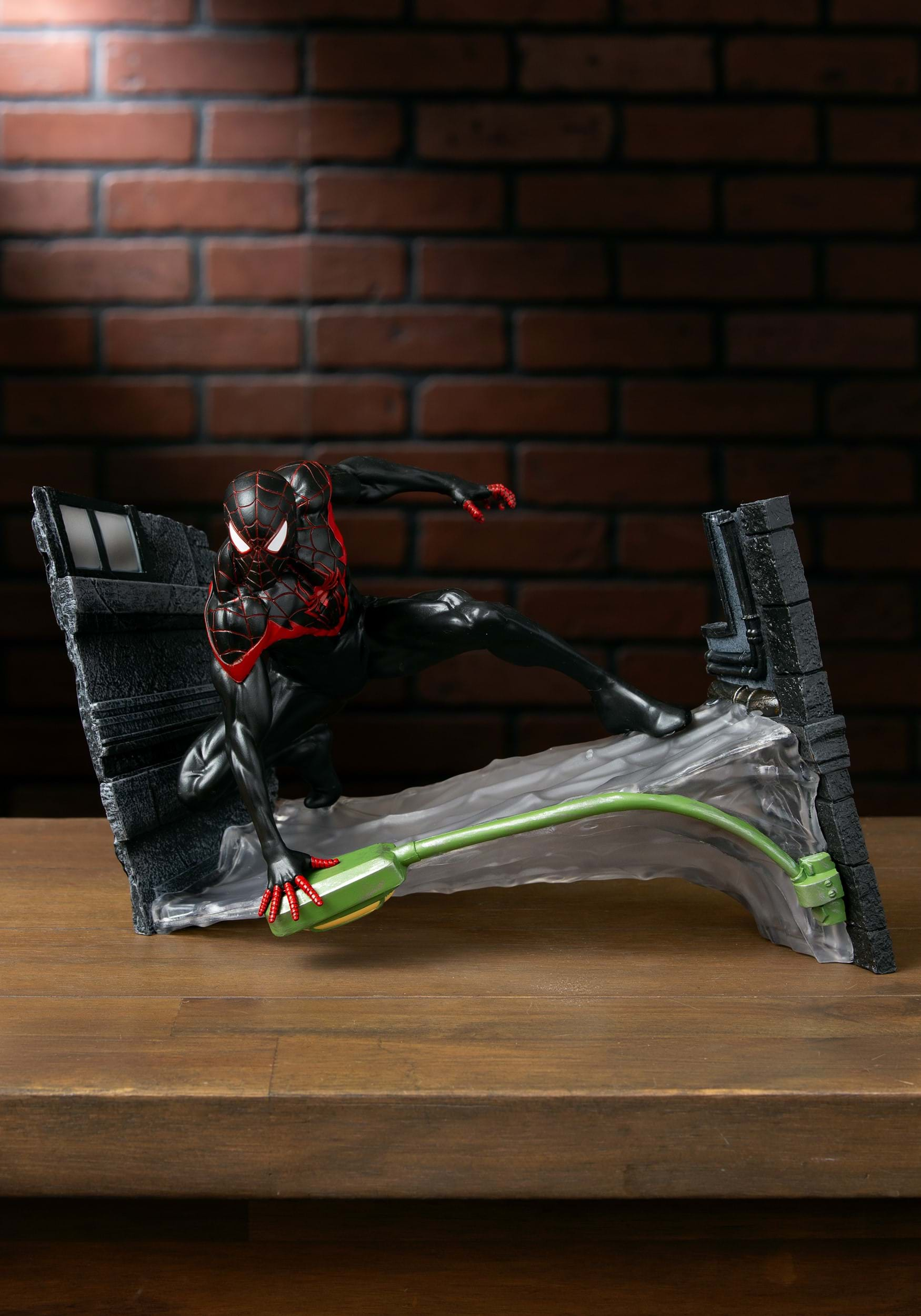 Miles deals morales statue